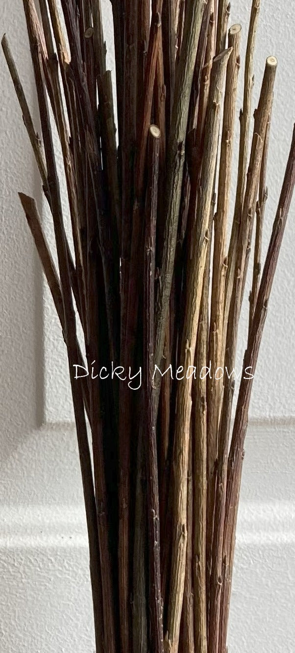 brown bark willow weaving rods branded 'Dicky Meadows'